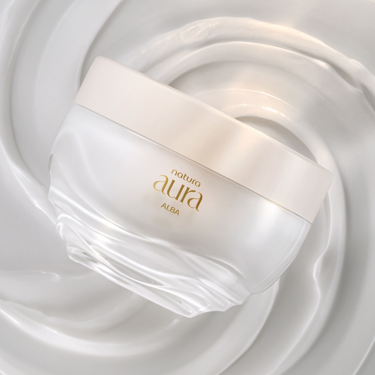 Imagem close-up da textura do Creme Aveludado Corporal Natura Aura Alba