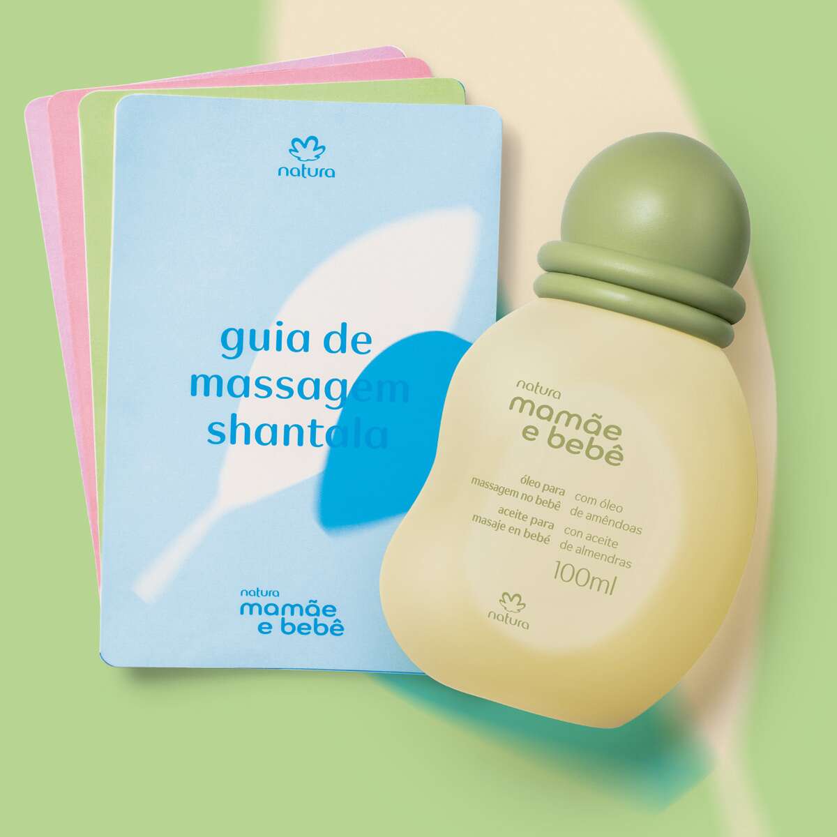 Ingredientes e embalagem do Óleo Mamãe e Bebê em destaque